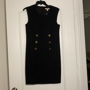 Cute black dress with 6 large gold buttons